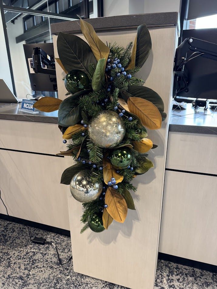 Magnolia and ornament swag on an office workstation