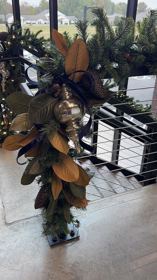 Magnolia and gold ornament newel-post swag