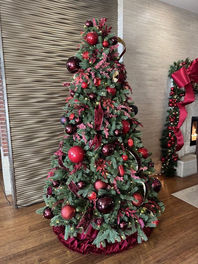 Burgundy and red decorated Christmas tree